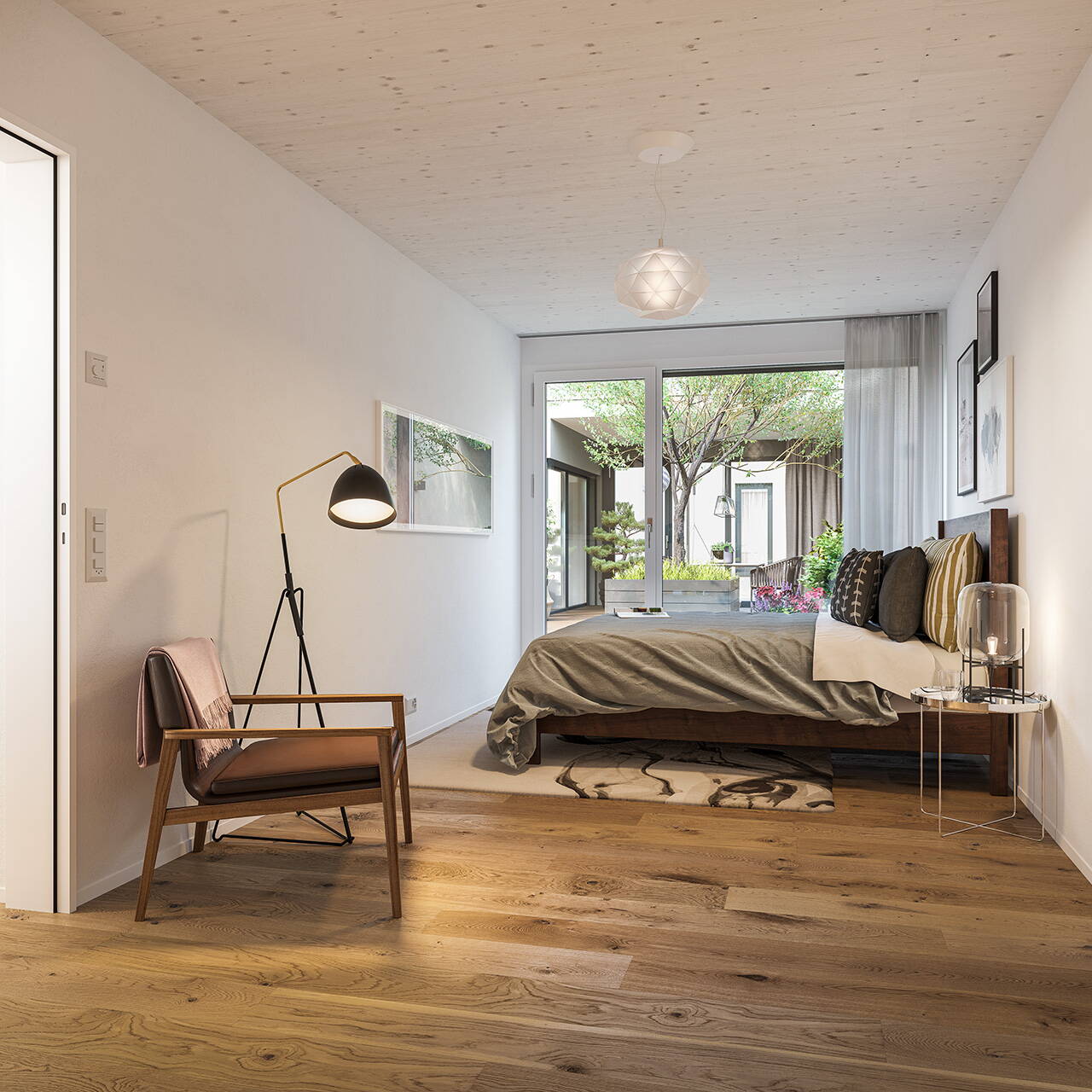 Elternschlafzimmer mit direktem Ausgang zum Atrium.